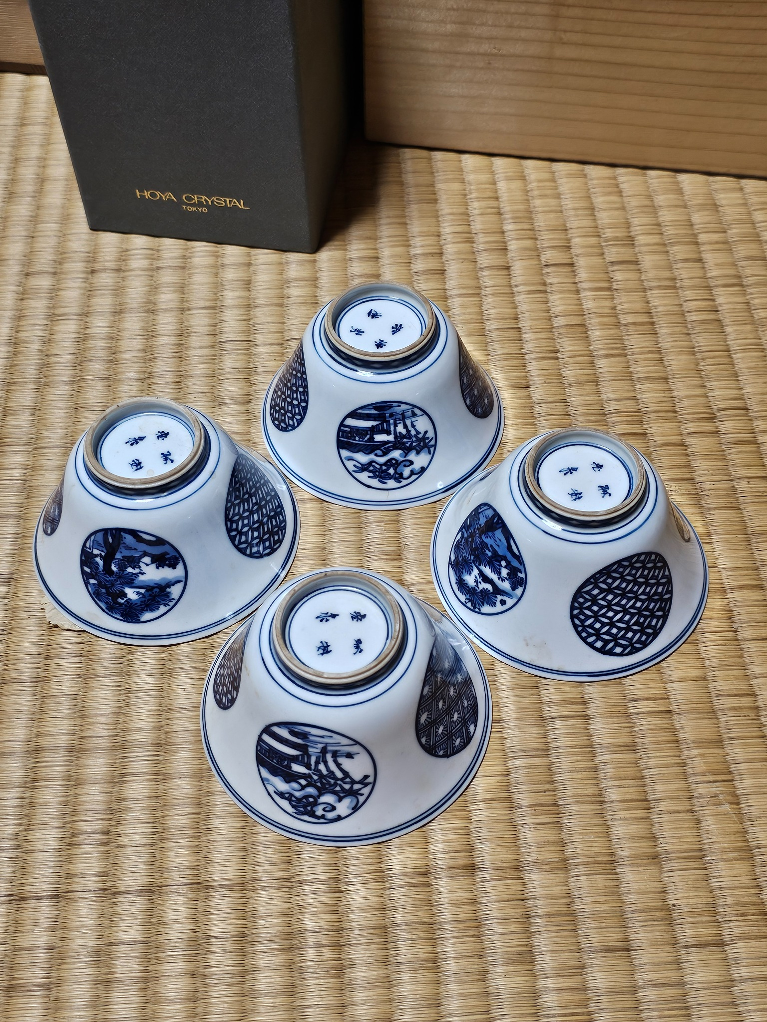 Blue and white bowl set grouped upside down.