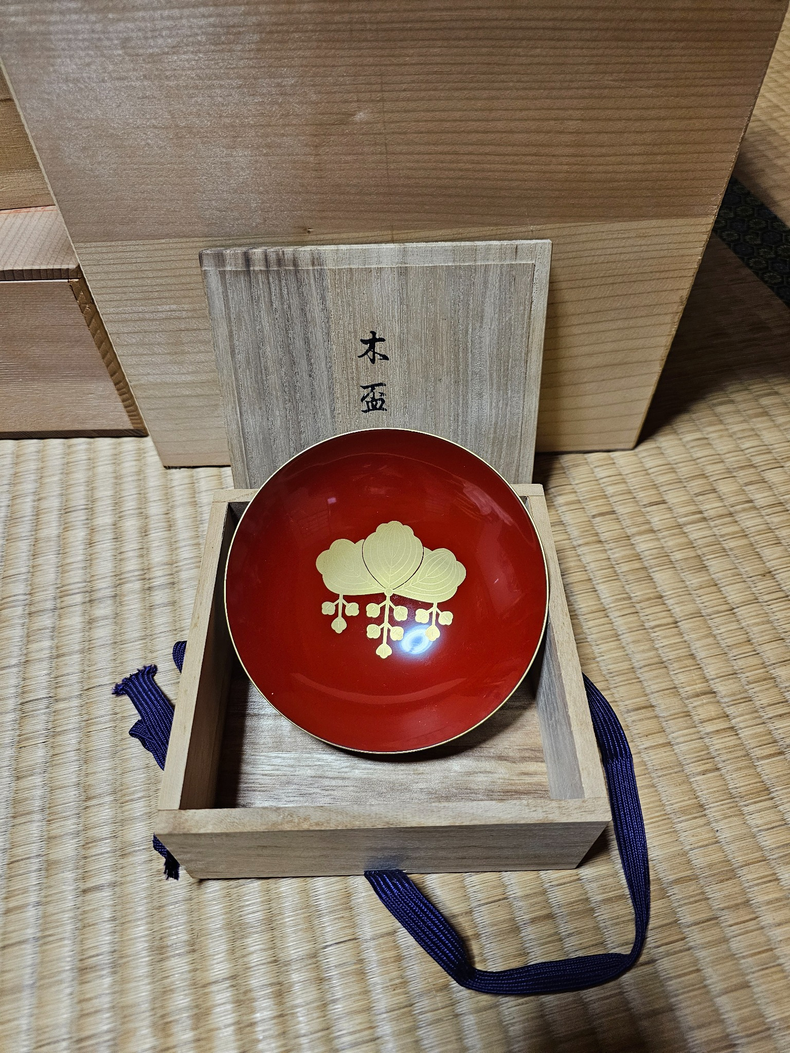 Ceremonial wooden sake cup in box.
