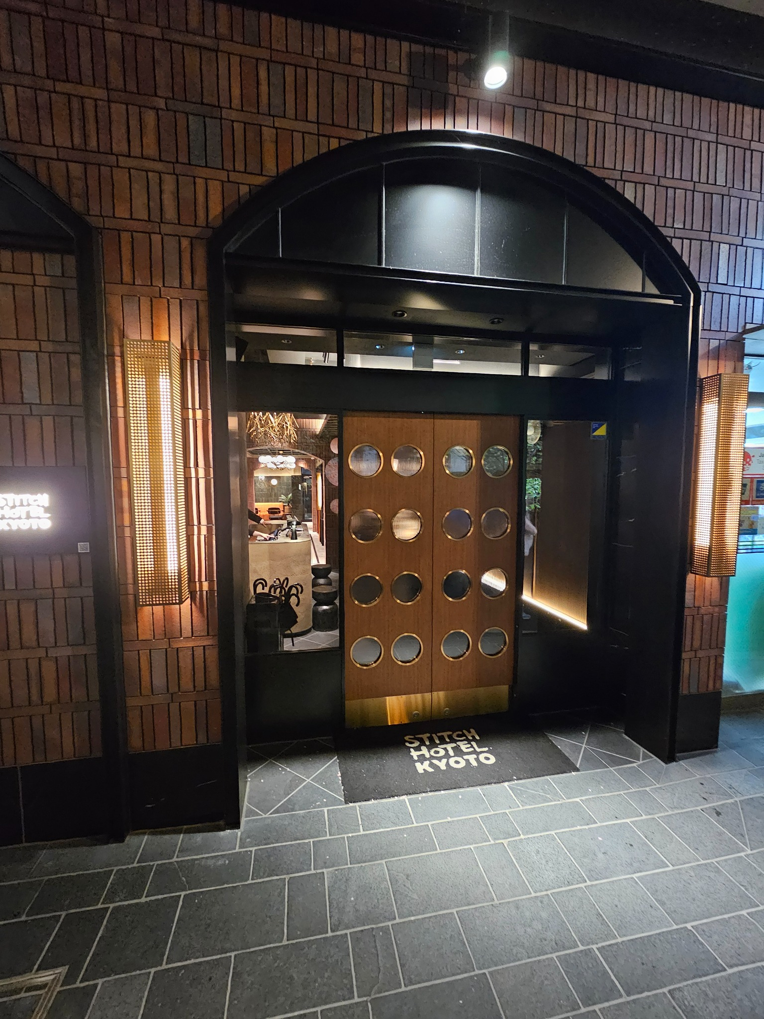 Stitch Hotel Kyoto night entrance.