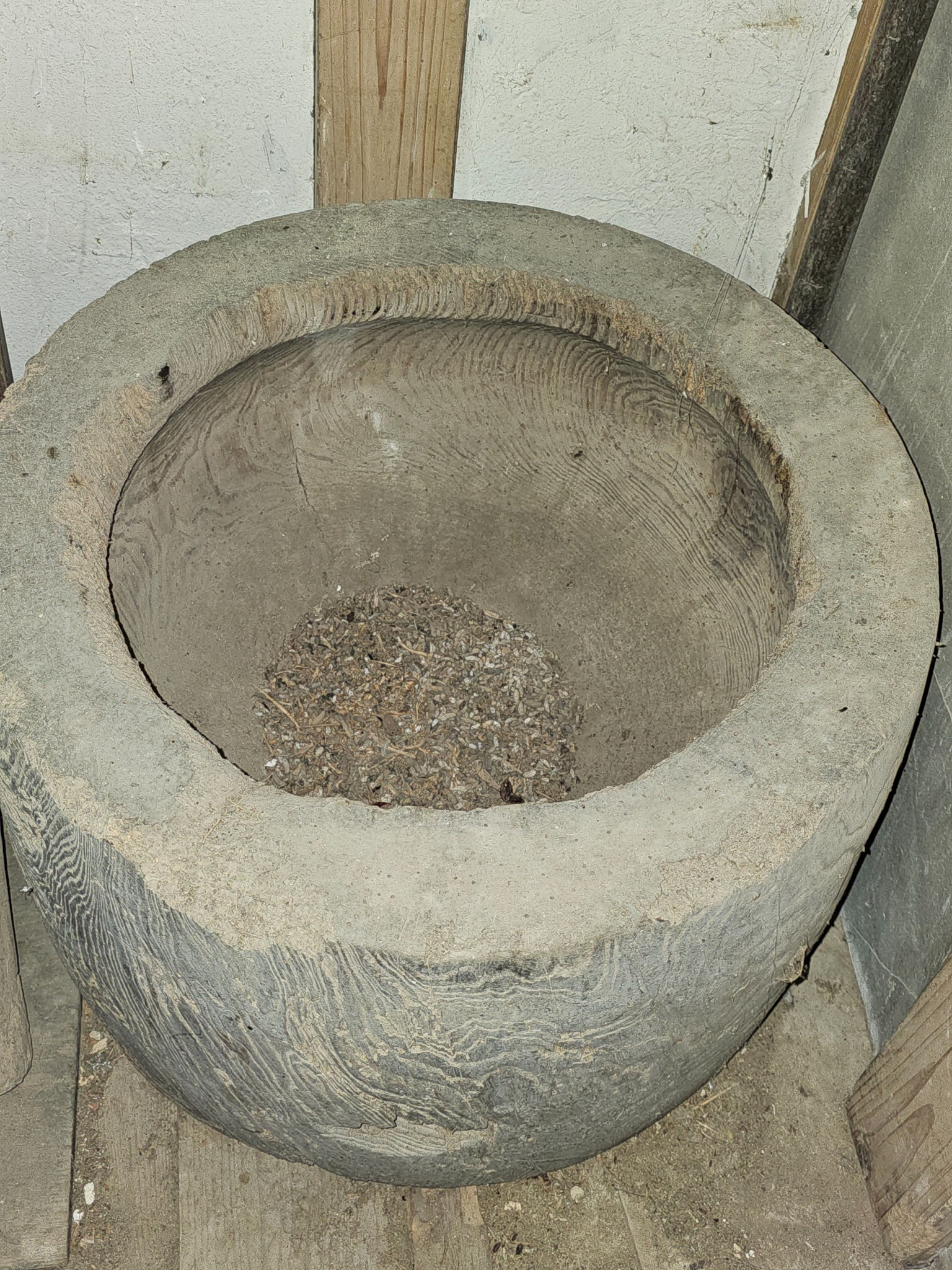 Usu settled in the corner of the kura.