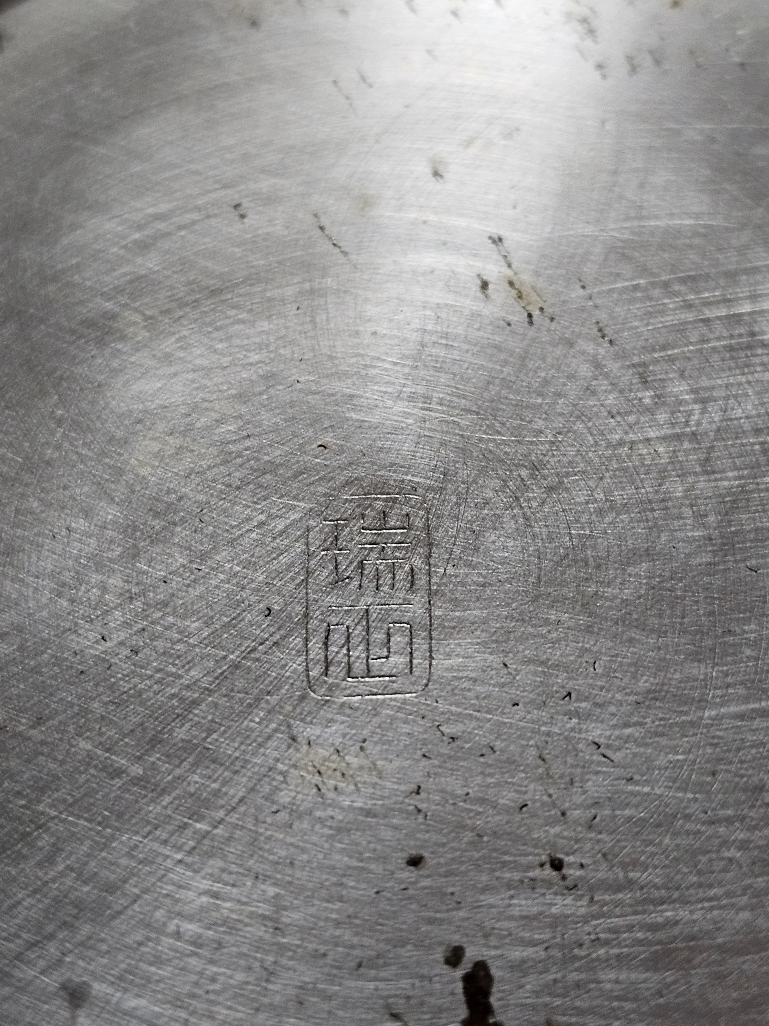 Silver maker's mark.