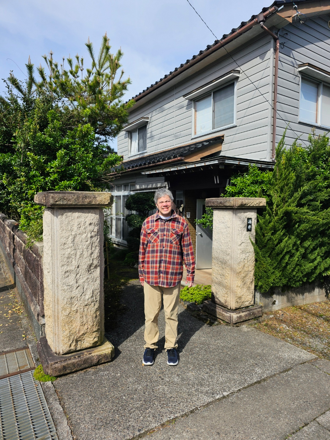 Tatsunari at the front gate.