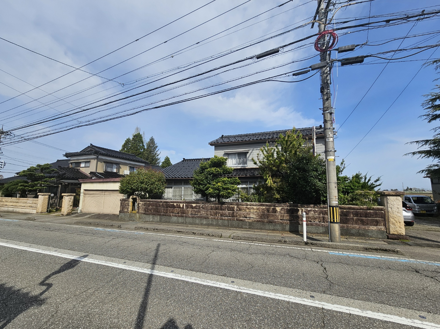 Another wide view across the street toward the Hanasaki house.