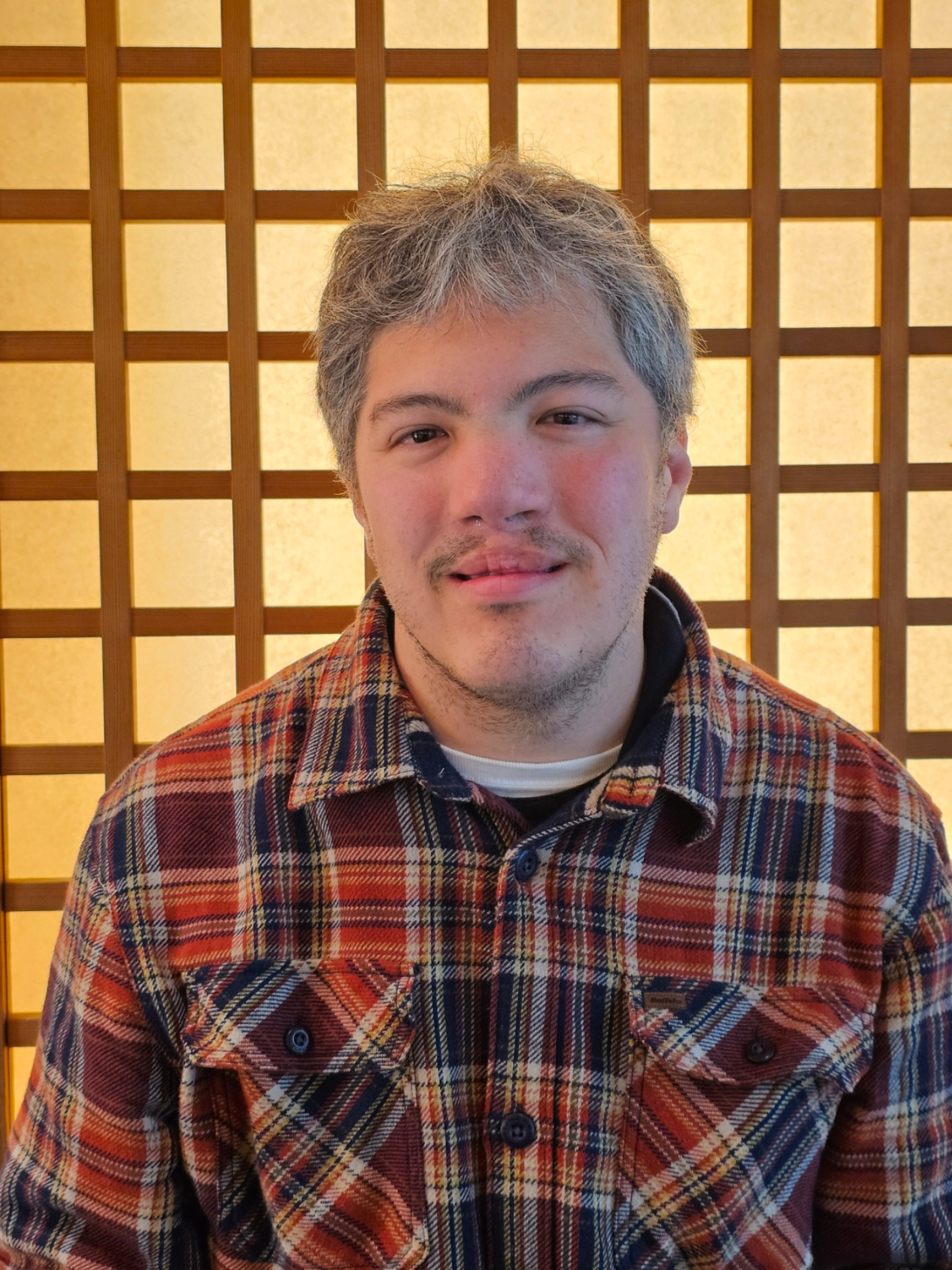 Tatsunari portrait against shoji screen.