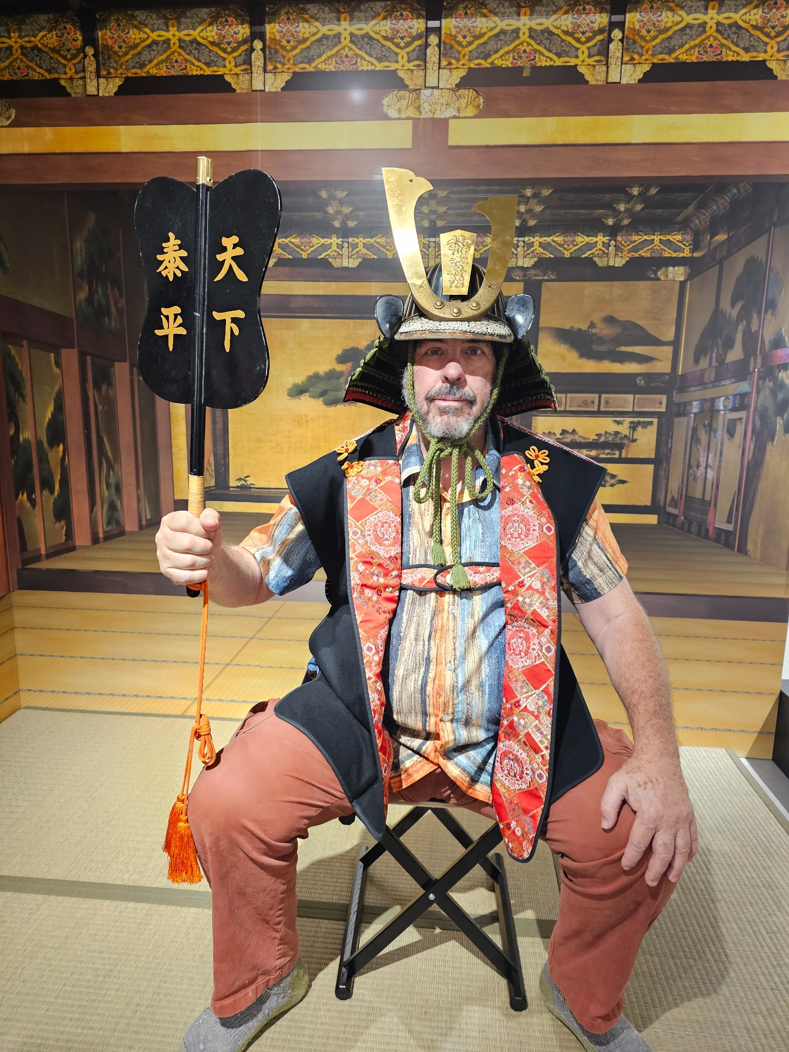 Brad in samurai helmet and command baton in Kyoto.