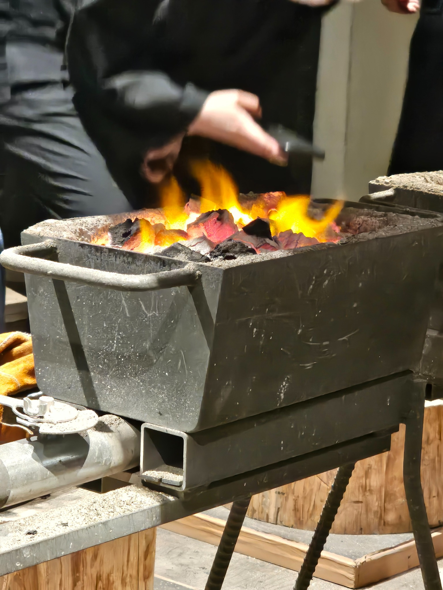 Forging demonstration with charcoal fire in Kyoto.