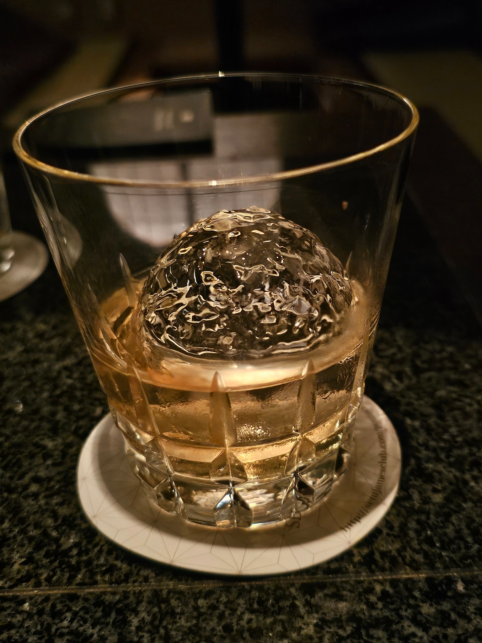 Whisky with large ice sphere in Kyoto.